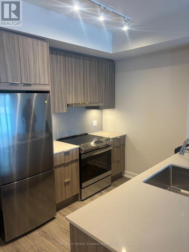 Building Photo - 430-3430 Square One Dr