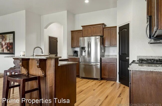 Foto del edificio - 4 br, 2 bath House - 13819 S. 89th Ave. E.