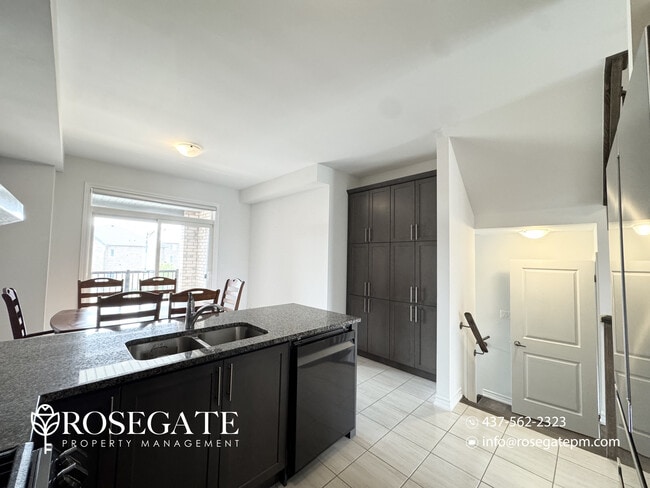 Building Photo - Spacious 4-Bedroom Freehold Townhome with Garage & Backyard – Brampton