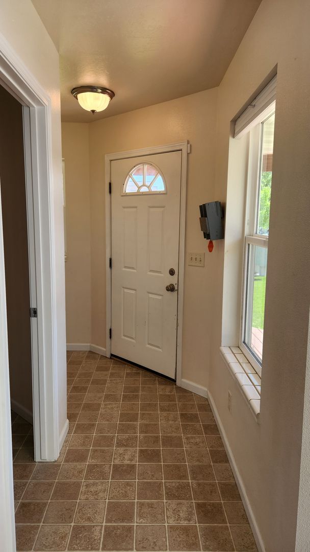 Building Photo - Beautiful House with Yard and Pets Considered