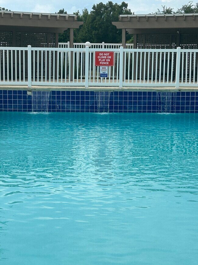 pool with waterfall - 450 Park Ave
