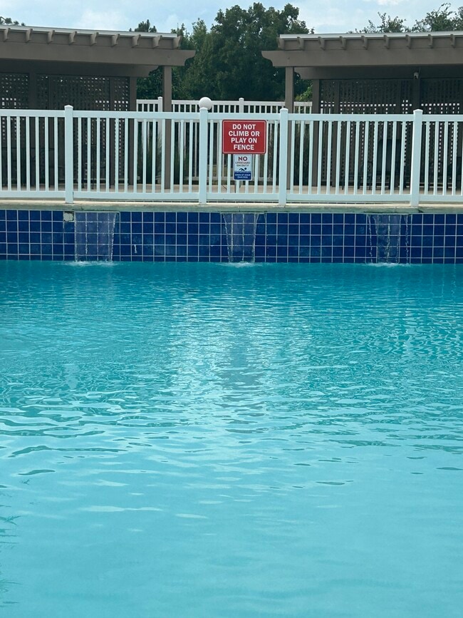 pool with waterfall - 450 Park Ave