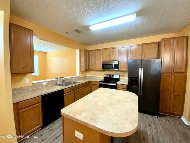Foto del edificio - 8654 Ribbon Falls Ln