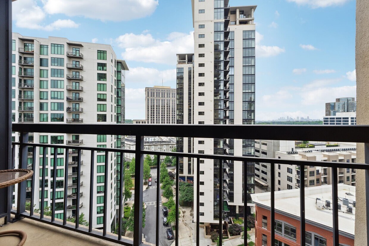 Primary Photo - Renovated Condo with Skyline Views