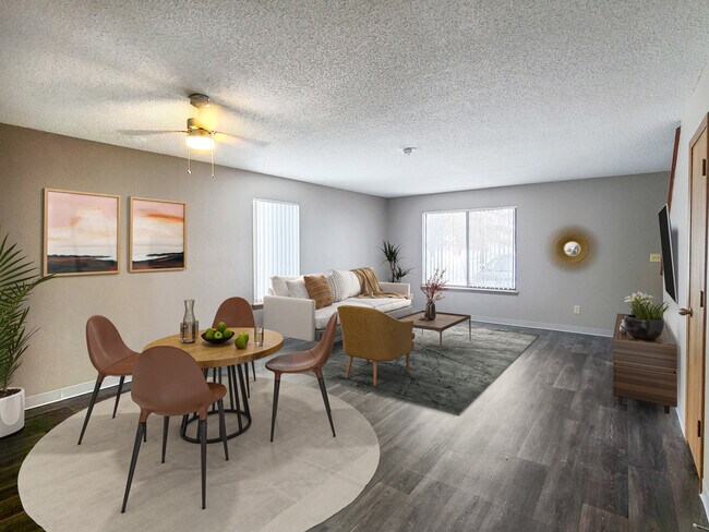 Sala de estar de un apartamento renovado de tres habitaciones en Prairie West en Ames, Iowa. - Prairie West