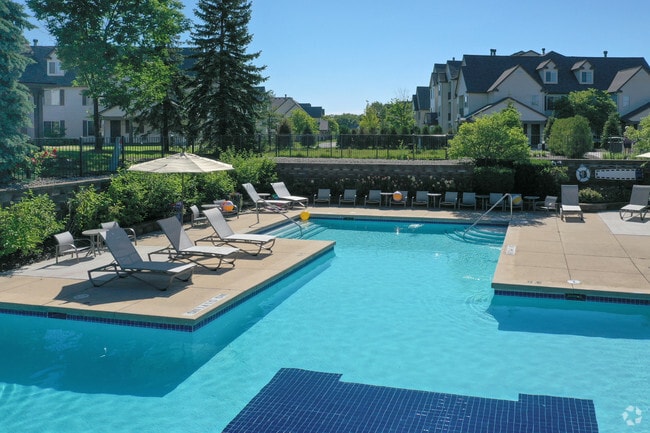 Swimming Pool with Lounge Chairs | The Villas at Main Street | Ann Arbor Apartments - The Villas at Main Street