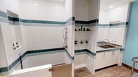 This single-level grooming or pet wash space is thoughtfully designed with both functionality and clean aesthetics in mind. The room is finished with bright white subway tiles accented by bold teal horizontal banding that runs consistently along the walls, creating a striking visual contrast and a cohesive, polished look throughout the space.

A walk-in wash station dominates one side of the room, equipped with a stainless steel handheld showerhead on an adjustable sliding rail, allowing for flexible use at varying heights. The enclosure features a low-entry stainless steel door panel, making access straightforward and practical. Built-in glass shelving is recessed into a tiled niche adjacent to the wash area, providing convenient storage for grooming supplies and accessories currently displayed on the shelves.

On the opposite side, a stainless steel utility sink with a gooseneck faucet sits atop clean white cabinetry, offering additional workspace and washing capabilities. The flooring transitions to wood-look tile planks, adding warmth to an otherwise crisp, clinical environment. Overall, the space balances durability and design effectively.