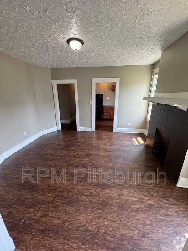 Building Photo - 311-313 W Burgess St