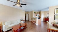 This well-appointed two-bedroom, two-bathroom residence in Gonzales, Louisiana offers a comfortable and functional single-floor layout. The living room greets you with warm wood-look flooring, a ceiling fan, and multiple windows fitted with blinds that fill the space with natural light. A distinctive arched niche adds a charming architectural detail to the room.

The kitchen is equipped with stainless steel appliances, including a refrigerator, range, and over-the-range microwave, complemented by warm oak cabinetry and granite-style countertops. A bright window overlooks the outdoors, enhancing the kitchen's inviting atmosphere.

The generously sized primary bedroom features plush carpeting, a ceiling fan, and direct access to its own bathroom, which includes a tub-shower combination. A dedicated walk-in closet offers multi-tier wire shelving for ample storage. The second bedroom is equally comfortable, with carpet flooring, a ceiling fan, and windows providing natural light. The second full bathroom mirrors the first, also featuring a tiled tub-shower combination and overhead cabinetry.

Throughout the home, neutral warm-toned walls create a cohesive and welcoming ambiance, with hallways connecting the rooms in a practical and well-organized floor plan.