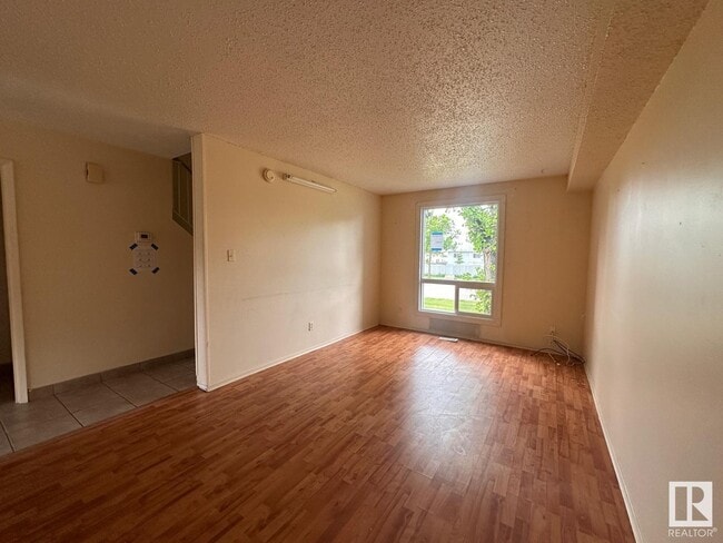 Building Photo - 3115-3144 144 Ave NW