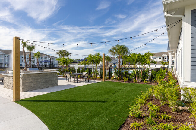 Lit Social Gaming Area - The Pointe at Palm Bay