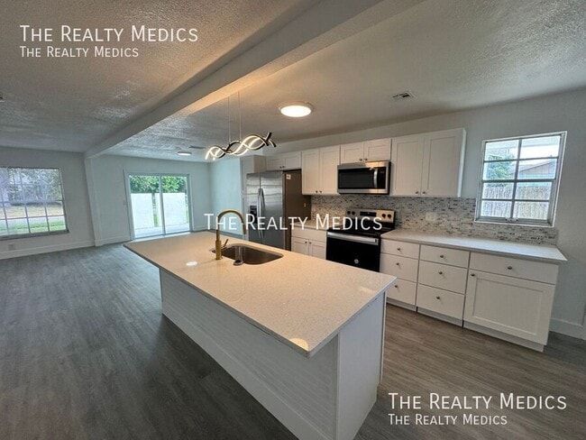 Foto del edificio - 1718 Palmer Ln