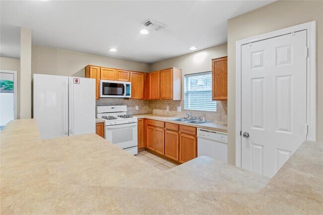 Building Photo - 18323 Atasca Wds Trce