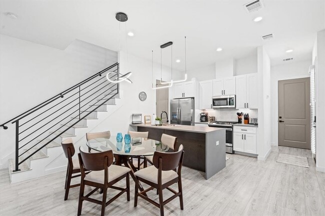 Photo - 6825 Cadillac St Townhome