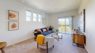 Located at 4161 Keegan St in Dublin, CA, this well-designed one-bedroom, one-bathroom residence offers a functional and comfortable single-floor layout. The living room is a bright, inviting space featuring plush carpeting, elevated windows that flood the room with natural light, and a sliding glass door opening to a private balcony with outdoor views. The open layout provides a comfortable area for both relaxing and entertaining.

The kitchen is efficiently organized in a galley-style configuration, featuring light wood cabinetry, tile flooring, a full suite of white appliances including a gas range, refrigerator, microwave, and dishwasher, along with a window for additional natural light.

The generously sized primary bedroom is a serene retreat with soft carpet flooring, multiple windows, and its own sliding glass door leading to the balcony, offering pleasant outdoor views. A dedicated walk-in closet provides ample storage. The bathroom features tile flooring and a full bathtub and shower combination.

Clean white walls and neutral tones throughout create a bright, cohesive aesthetic. A hallway connects the main living spaces efficiently, completing this thoughtfully laid-out residence in the heart of Dublin.