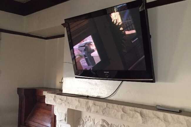 large tv with antenna access - 3028 8th Ave