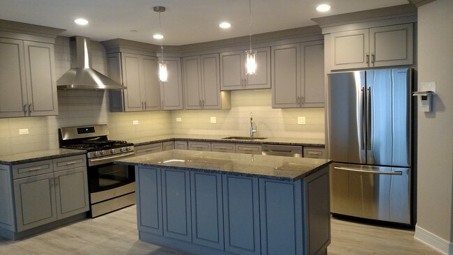 Staircase Detail Staircase Kitchen Remodel Cherry Kitchen Cabinets Backsplash Hardwood Floors Granite C Commercial Remodeling Remodel Design Your Kitchen