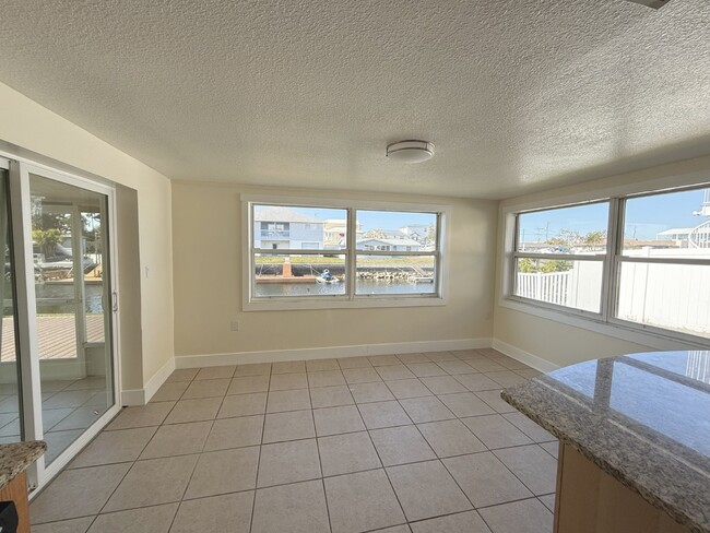 Building Photo - "Charming 3-Bedroom Home with Granite Countertops on Sunfish Drive, Hudson, FL!"