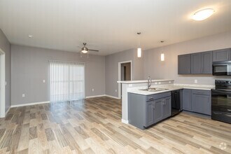 2BR, 2BA - 935SF - Living Room/ Dining Room - Jefferson Heights Apartments, LLC