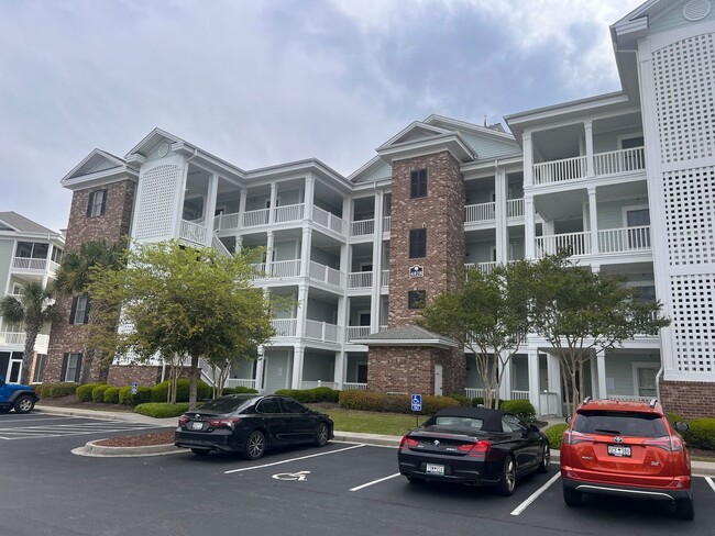 Building Photo - 4828 Magnolia - 303
