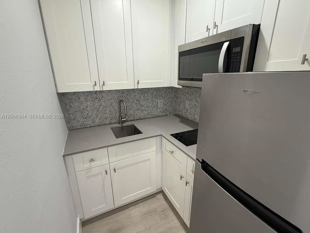 Building Photo - 6647 SW 59th Pl