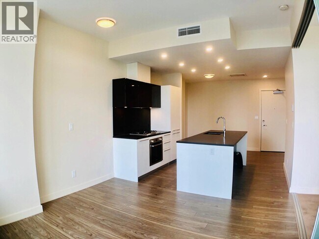 Photo du bâtiment - 6383 McKay Ave