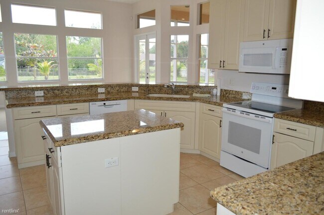 Building Photo - 4 br, 3.5 bath House - 11066 57thrd Road N