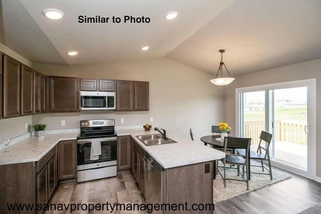 Building Photo - Charming Hoover Ranch in Bondurant – Move-In Ready for July!