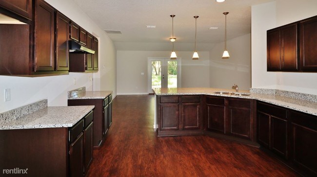 Building Photo - 4 br, 2 bath House - 7024 Paul Howard Dr