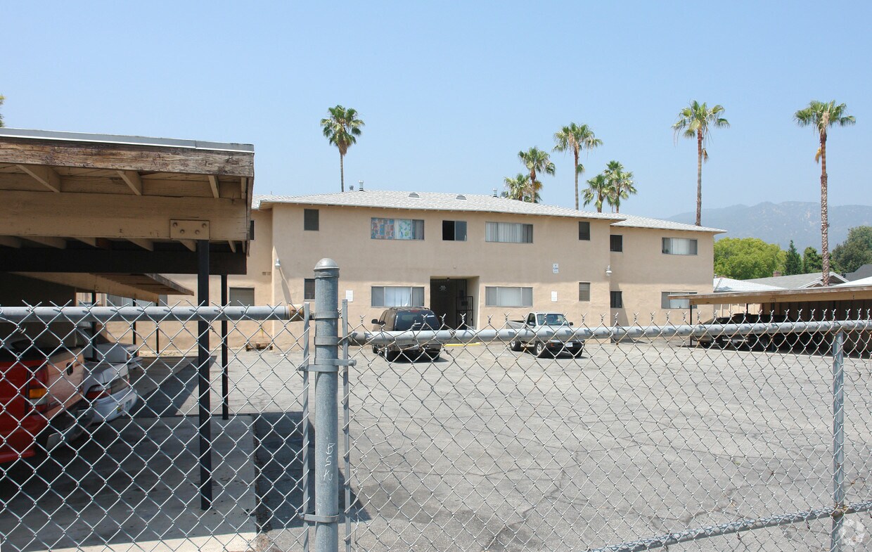 Building Photo - Whispering Palms Apartments