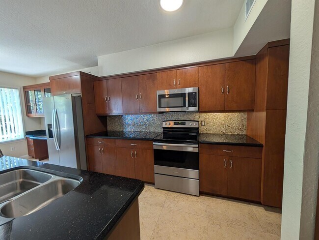 Foto del edificio - 6966 W Sample Rd