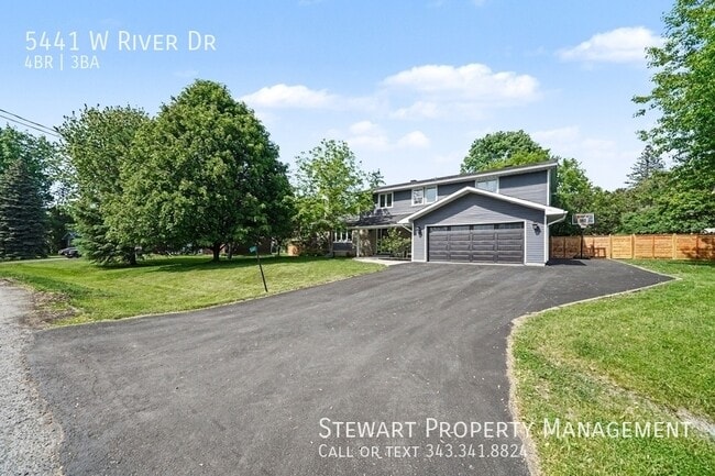 Building Photo - 5441 W River Dr