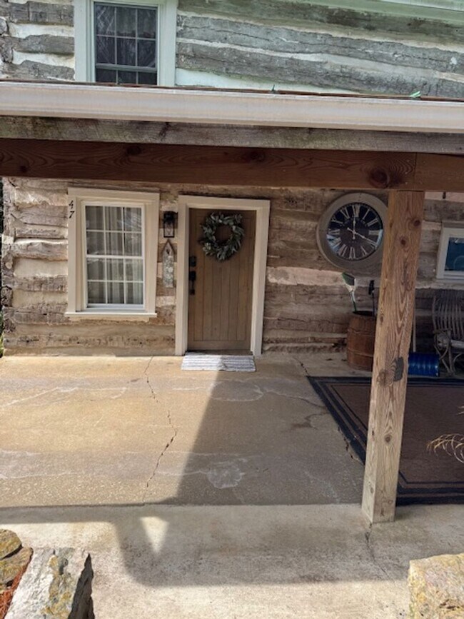 Building Photo - Renovated Log Cabin