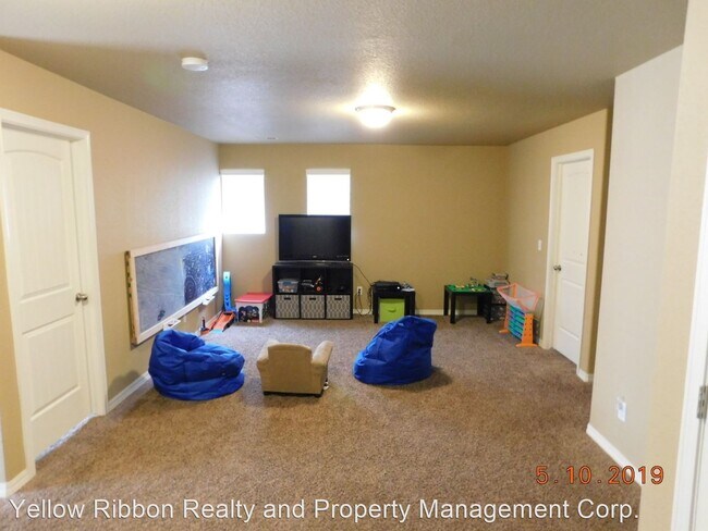 Building Photo - 4 br, 3 bath House - 9511 Desert Lily Circle