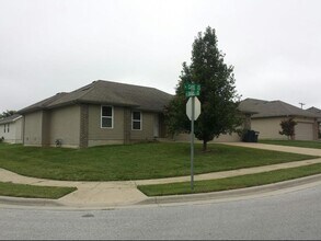 Building Photo - 1002 Care Ave