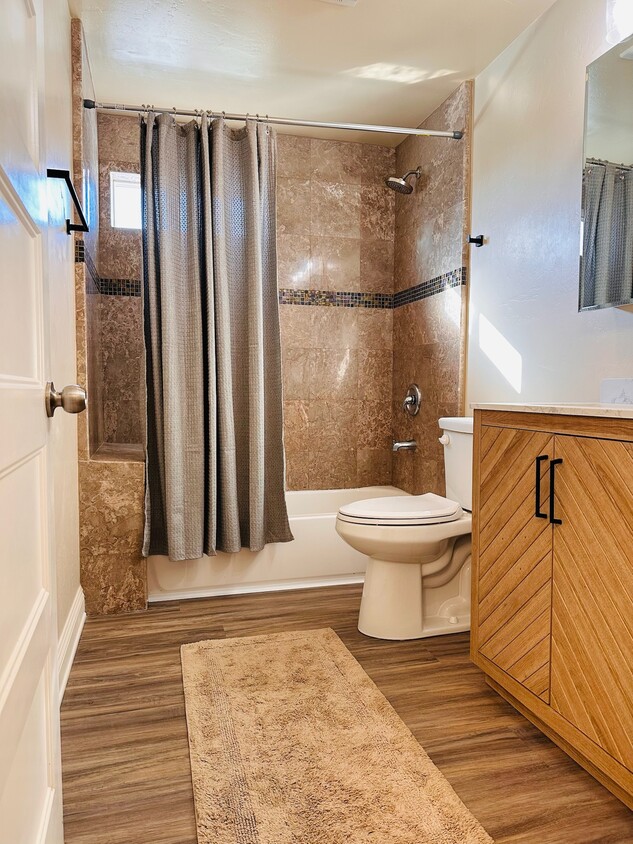 Bathroom with shower/tub and brand new vanity. - 358 22nd St