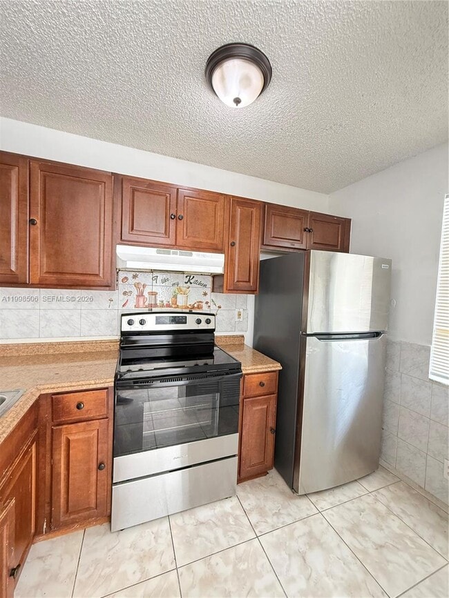 Foto del edificio - 4295 NW 114th Terrace