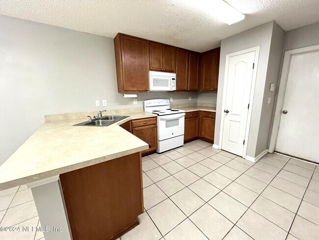 Foto del edificio - 7661 Melvin Rd