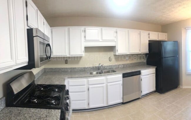 Foto del edificio - 6574 Meadow Green Cir