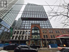 Building Photo - 100 Queen St E