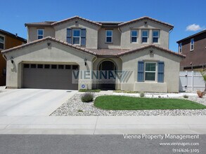 Building Photo - 5635 Saratoga Cir