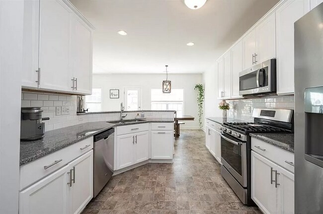 L1:Kitchen - White Cabinets - 720 Laurel Spring Dr