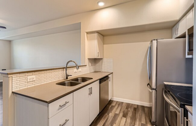 Building Photo - Beautifully Updated Bethany Condo with Pri...