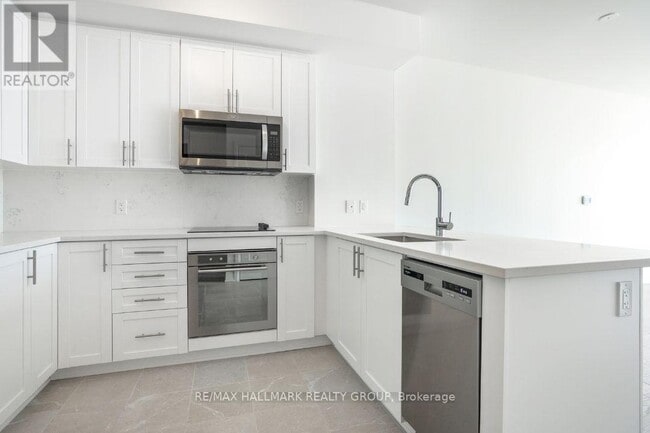 Photo du bâtiment - 805-1805 Carling Ave