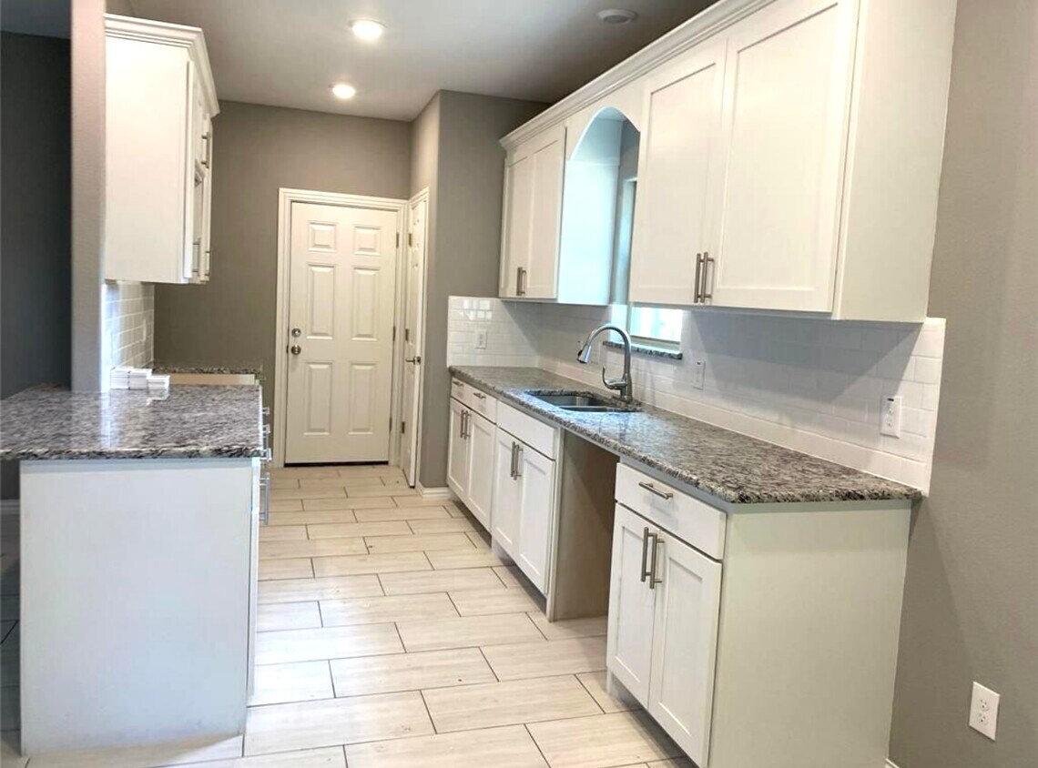 Kitchen will include fridge, dishwasher, microwave and stove - 1511 Illinois Ave