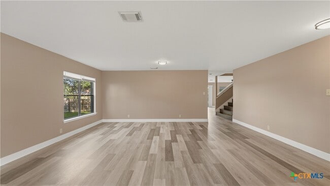 Building Photo - 7338 Raintree Forest