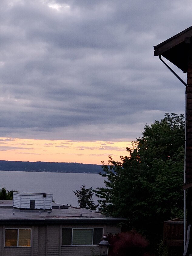Sunset from living room window - 7013 Seaview Terrace SW