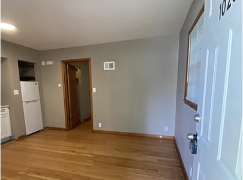Living Room and Kitchen View from Front Door. - 1028 S 24th St