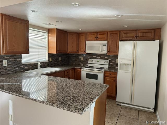 Building Photo - 12625 E Pacific Cir