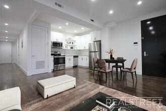 Building Photo - Stunning Giant New 2 BED with GARAGE & W/D...